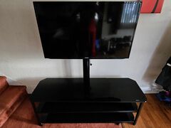 42" Samsung LCD TV w/ Black Innovex stand.