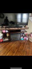 TV Stand With Fire Place In Great Condition