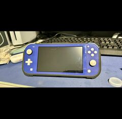 Nintendo Switch Lite including games and charger