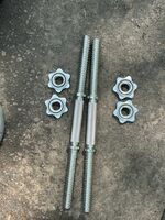 Dumbell Handles With A Bunch Of Weights