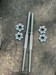 Dumbell Handles With A Bunch Of Weights