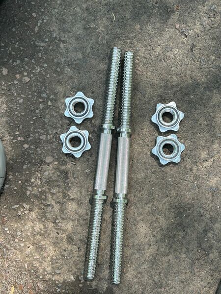 Dumbell Handles With A Bunch Of Weights