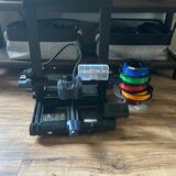 3d printer, filament, and extra nozzles included