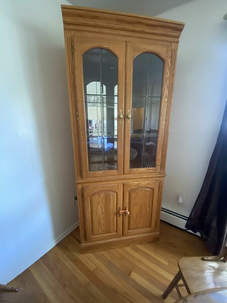 Wooden cabinet with glass interior