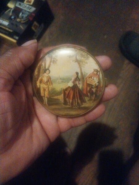 Antique 2-sided mirror.