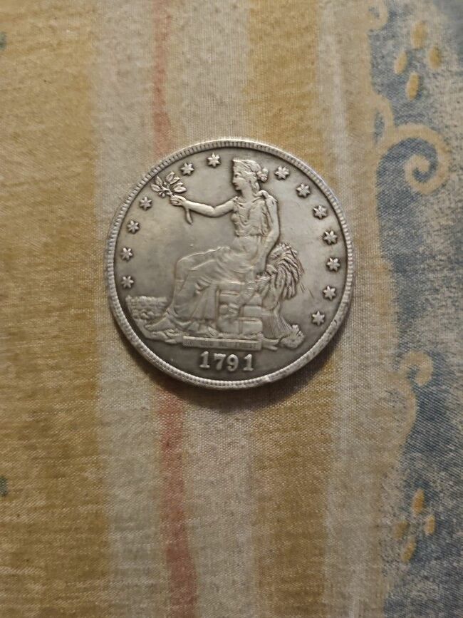 Both Dollars One Is Silver The Other One Oz Coper