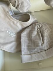 Authentic Fendi gender neutral baby sleeper bib and hat set