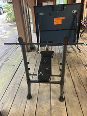 Adjustable Bench Presss With Barbell And Plates