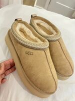 Ugg Taz Platform Slippers In Suede/Sand