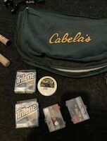Cabela’s Ice Fishing Rods and Reels in their own case.